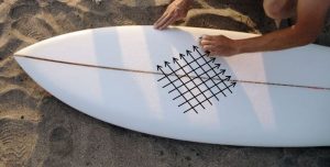 how to wax a surfboard